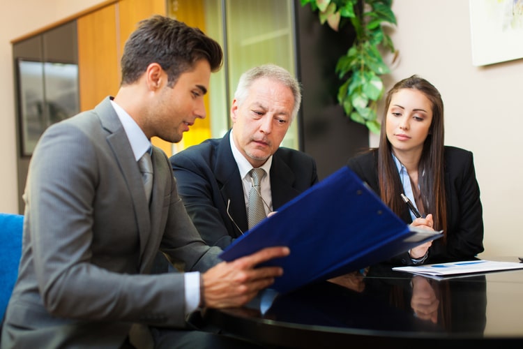 Man leading business meeting.