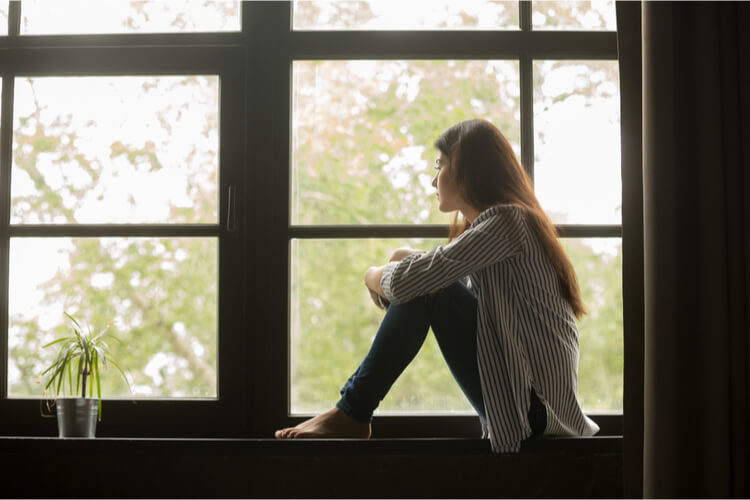 what no one tells you becoming entrepreneur lonely woman by window